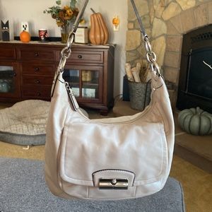 Coach Kristin Champagne Beige Leather
Medium Hobo Shoulder Bag Latch Pocket
